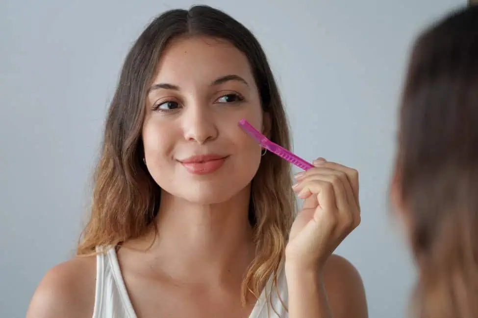 Woman Dermaplaning treatment